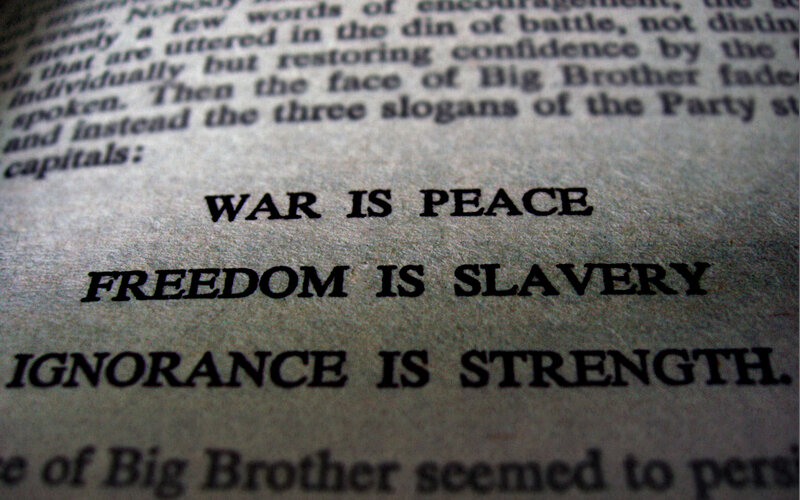 book with propaganda slogans
