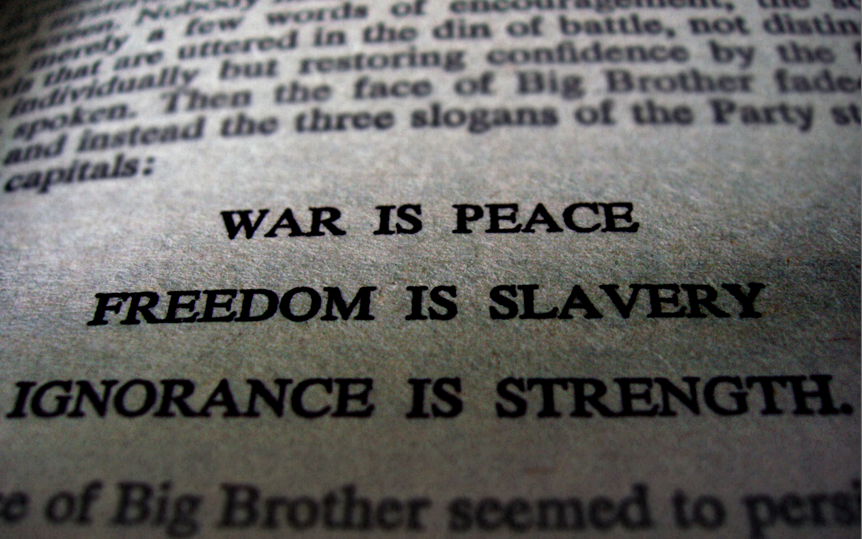 book with propaganda slogans