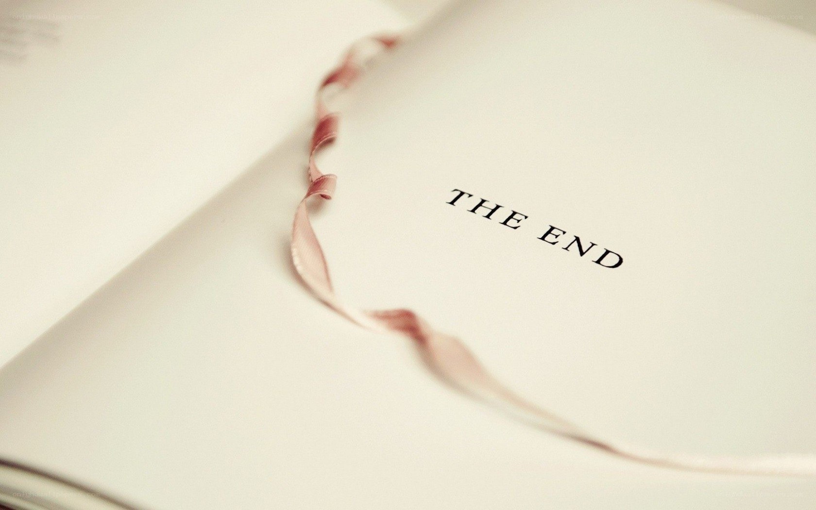 book with ribbon bookmark