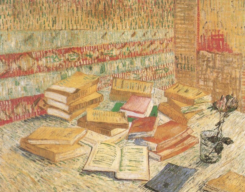 Books and a Rose on a Table