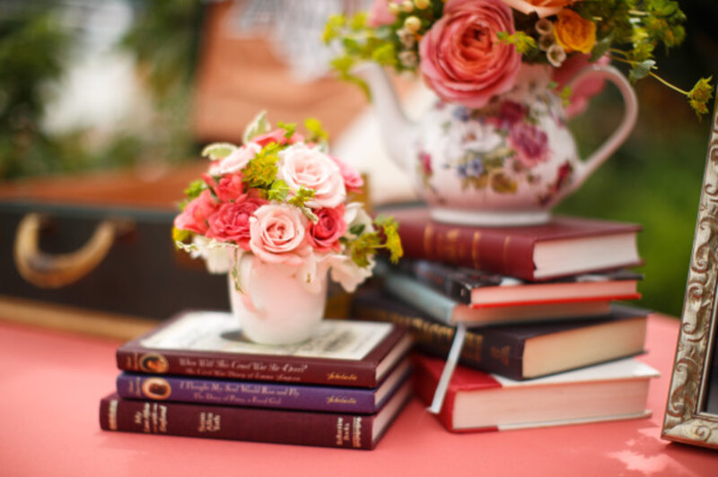 Books and Flowers on Table — Pink