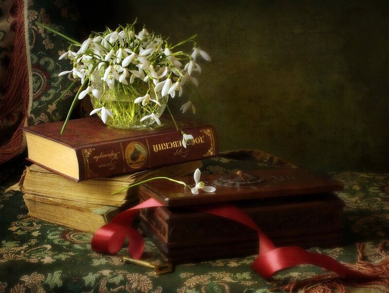 Books and Flowers on Table