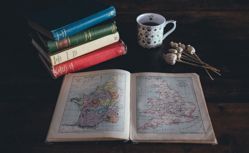 Books and map on a table