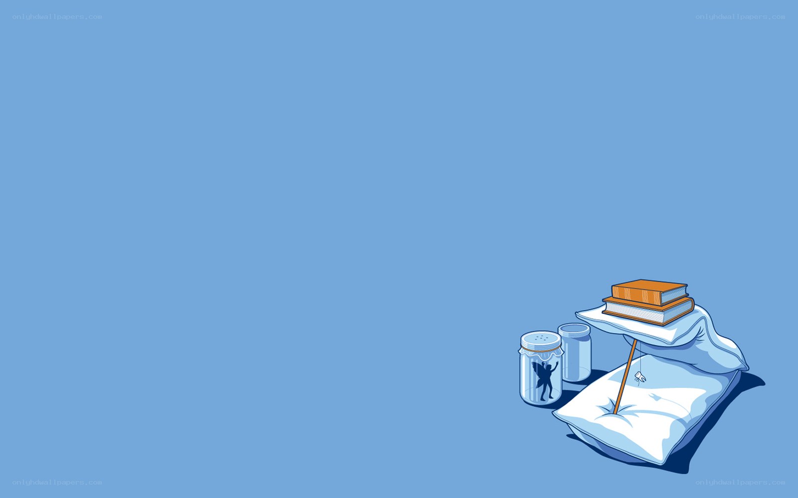 Books and pillows on blue