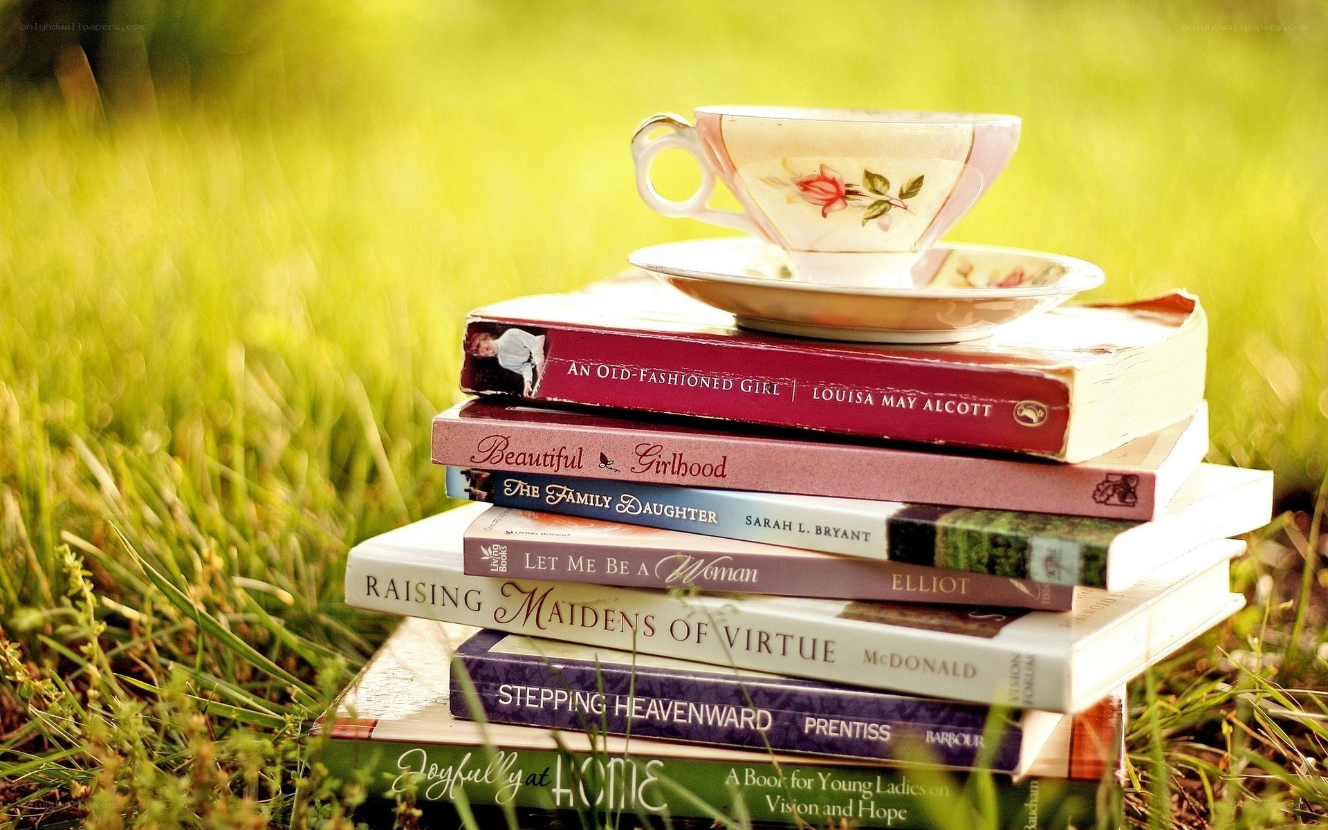 Books and tea in the grass