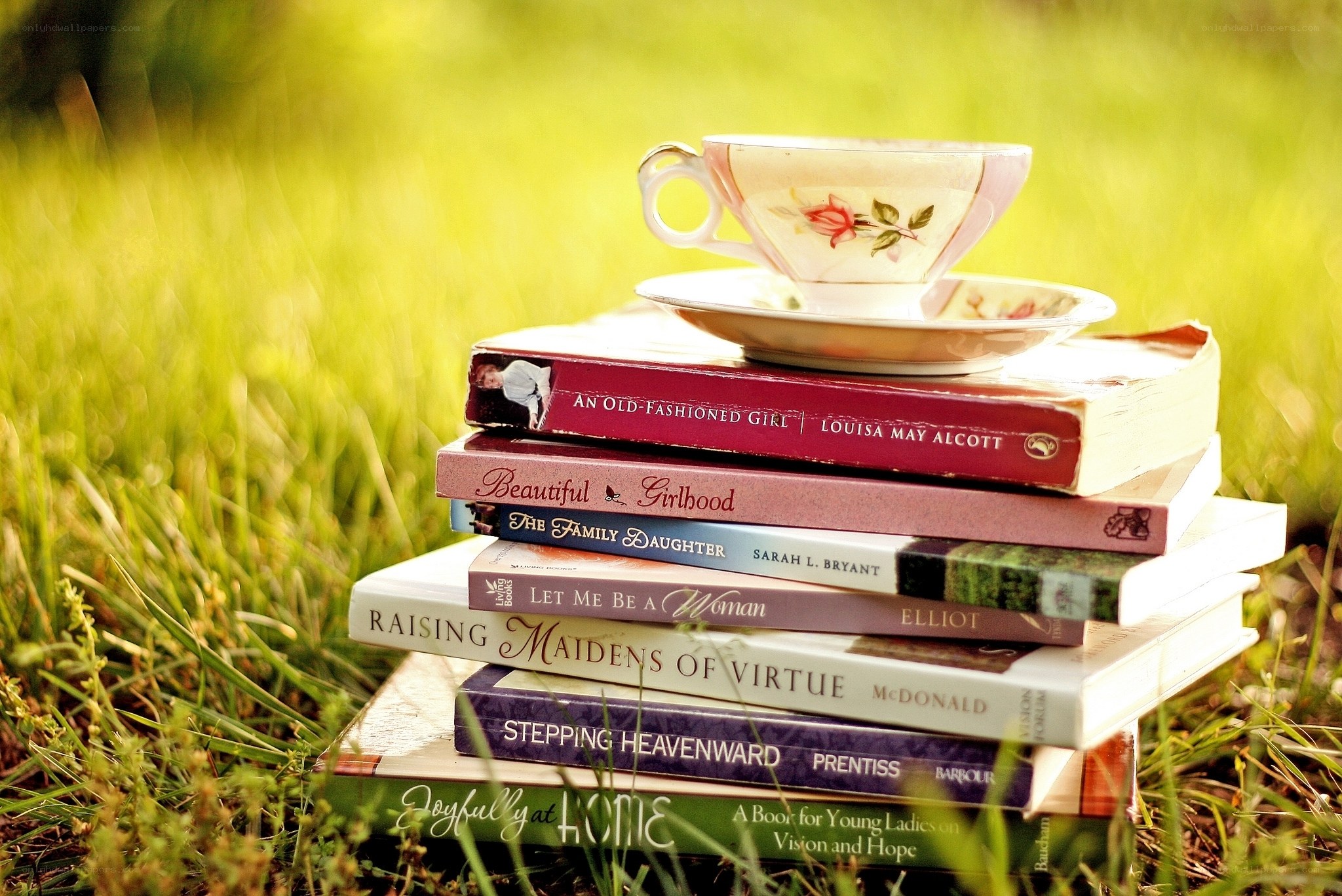 Books and tea in the grass