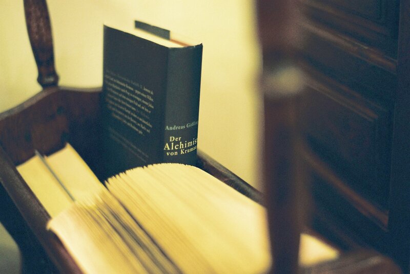 Books on a wooden shelf