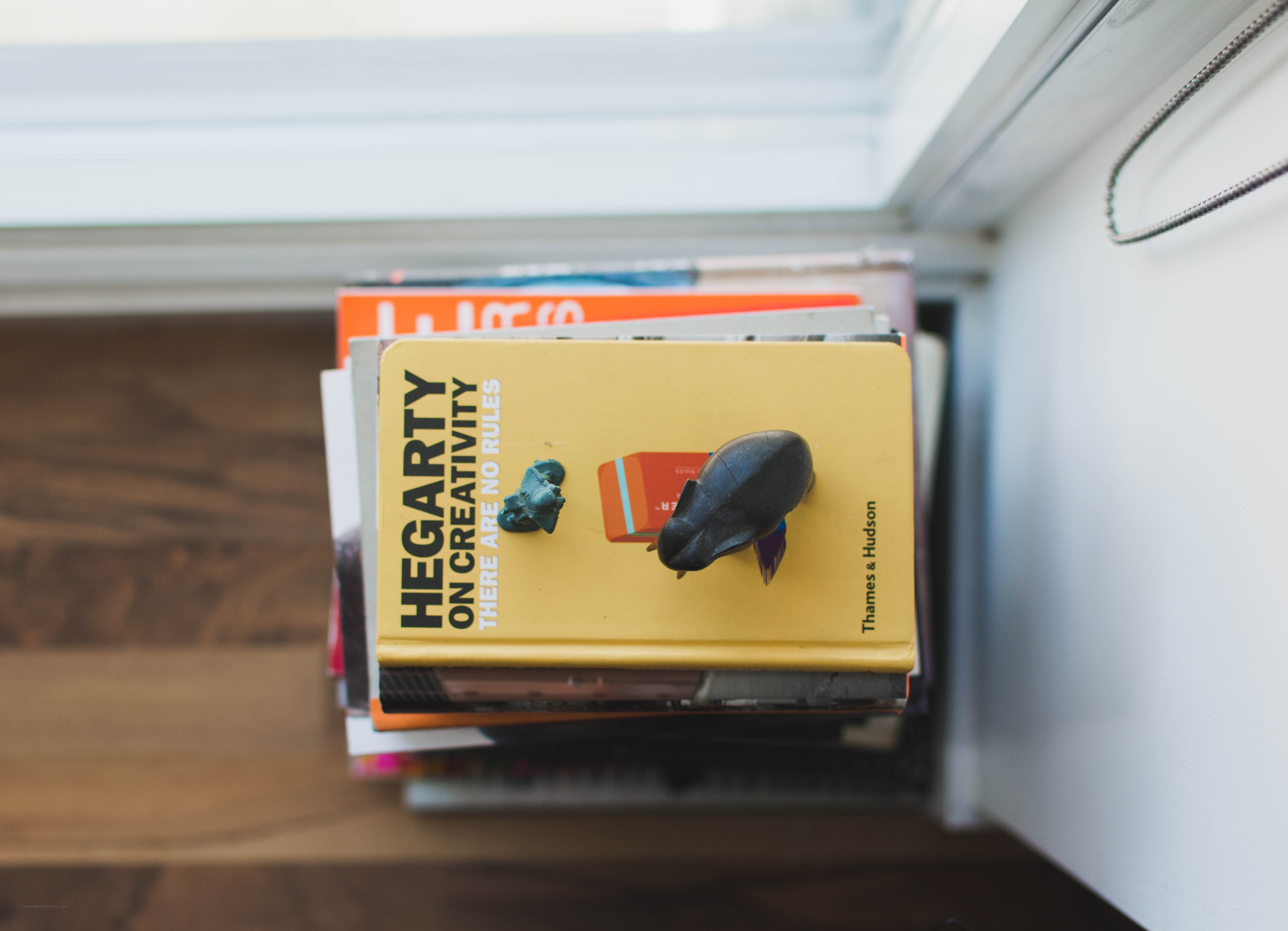 Books stacked on a shelf