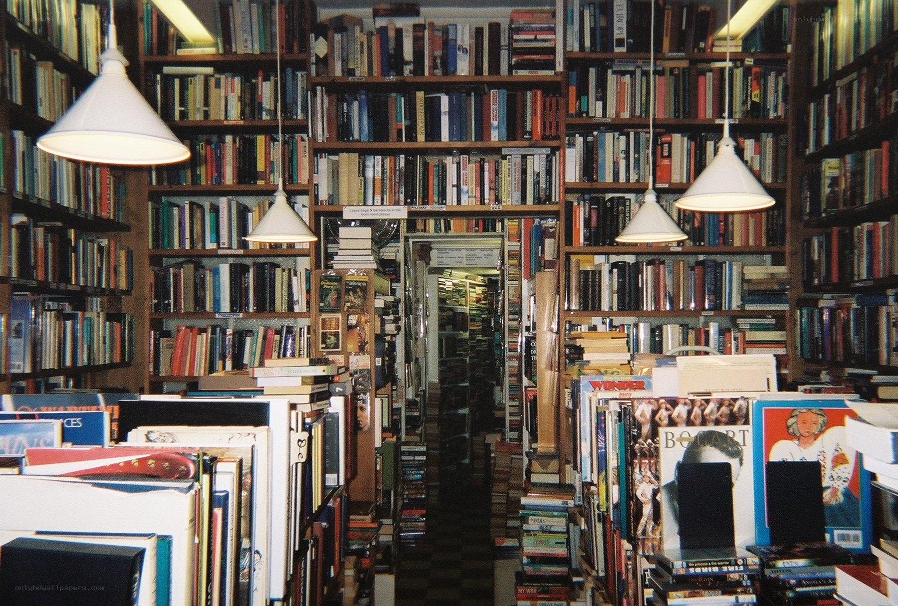 bookstore aisle with hanging lights