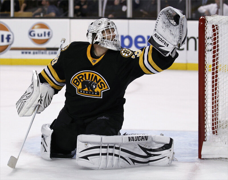 Boston Bruins goalie celebrates