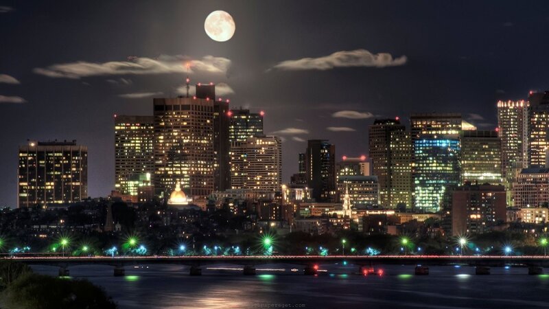 Boston skyline at night with full moon