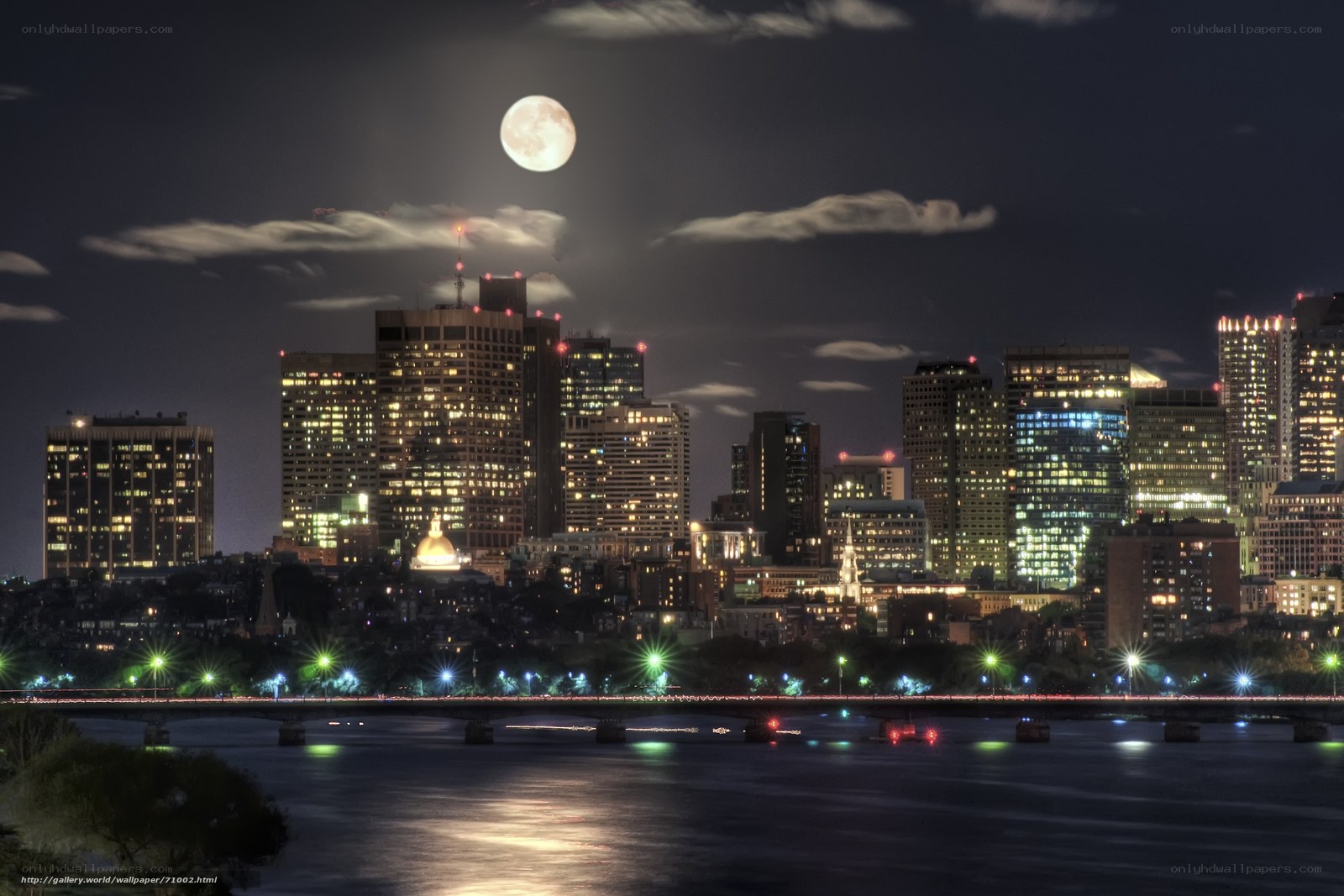 Boston skyline at night with full moon