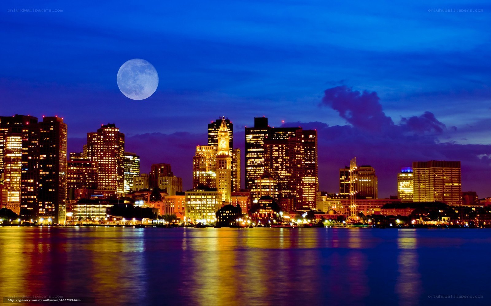 Boston skyline at night with moon