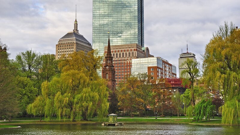 Boston skyline with park and pond