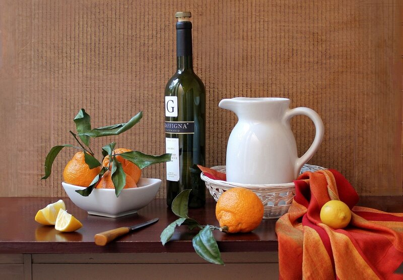 Bottle and Citrus Fruits