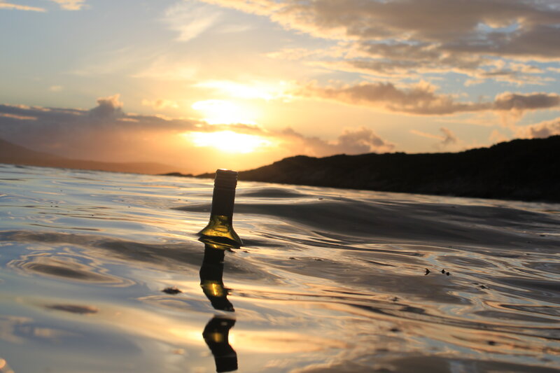 Bottle in Water — Gold
