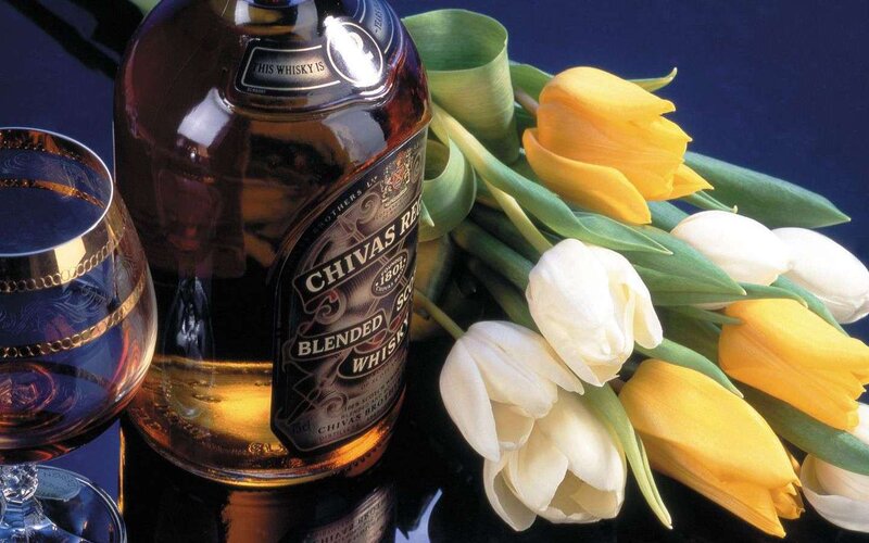 Bottle of Whisky and Flowers