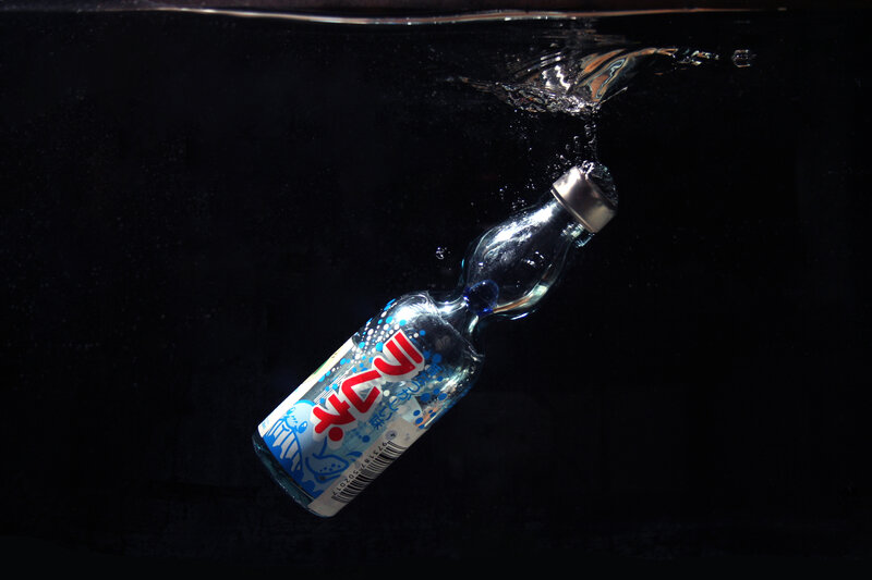 bottle submerged in water
