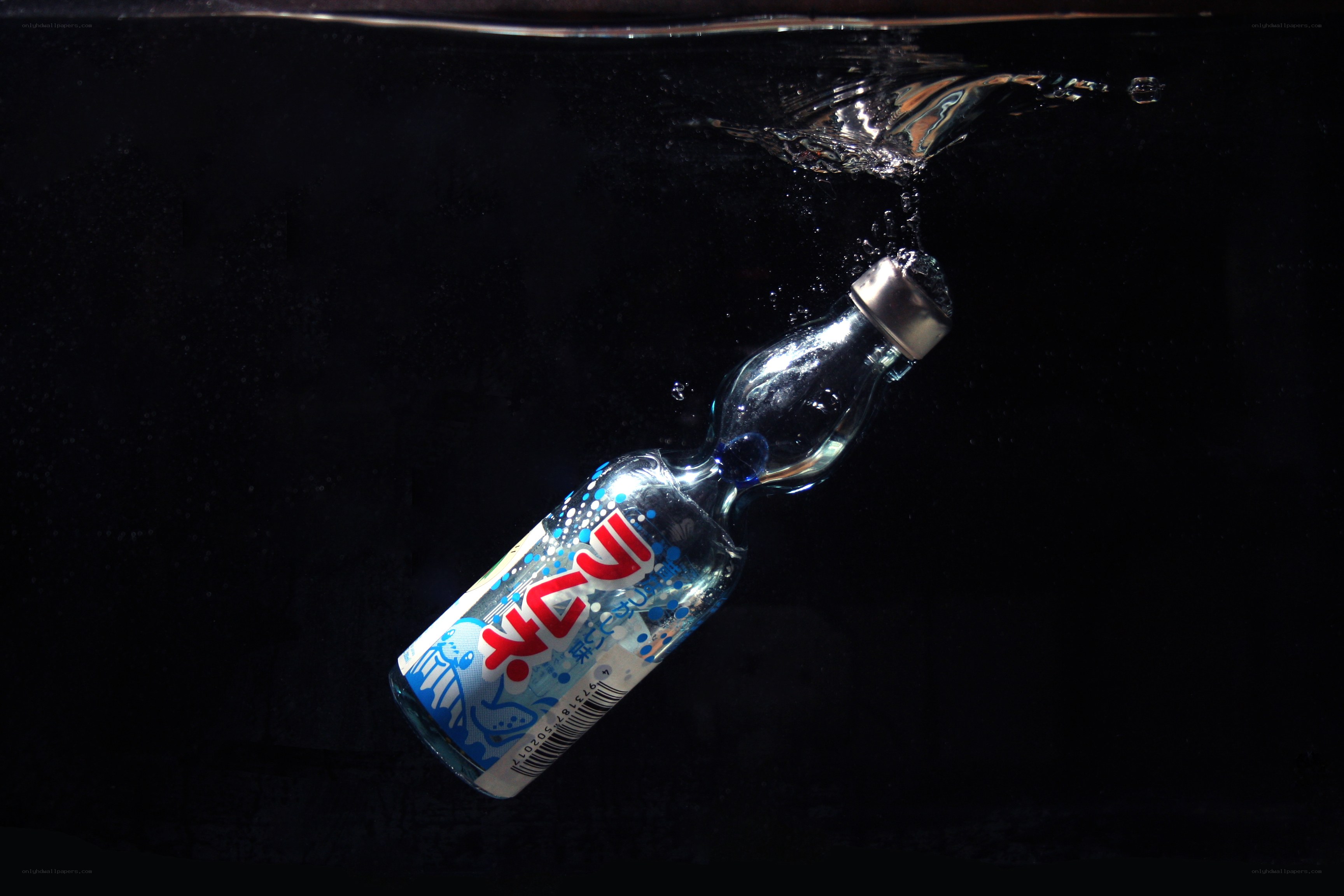 bottle submerged in water