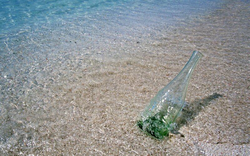 Bottle washed ashore on beach