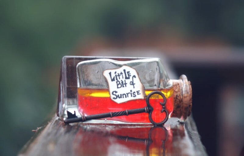 Bottle with Key and Liquid