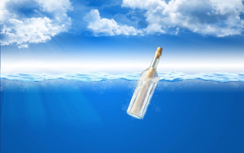 bottle with message in ocean