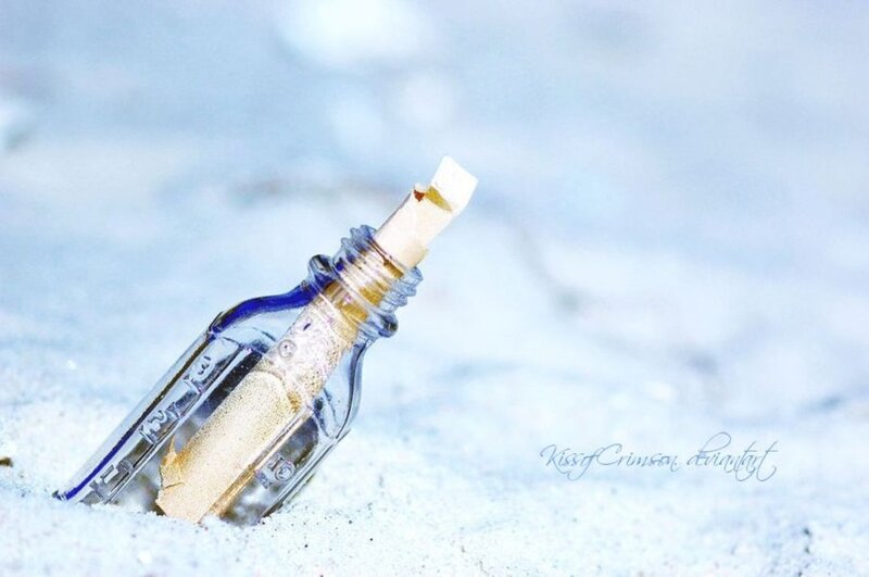 Bottle with Message in Sand