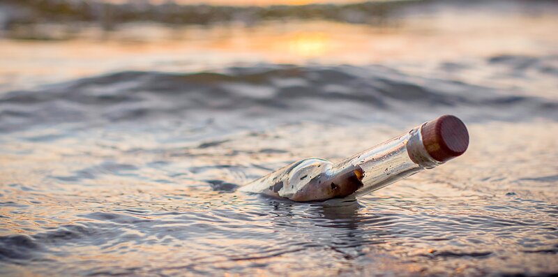Bottle with Message in Water — Blue, Serene, Sunset