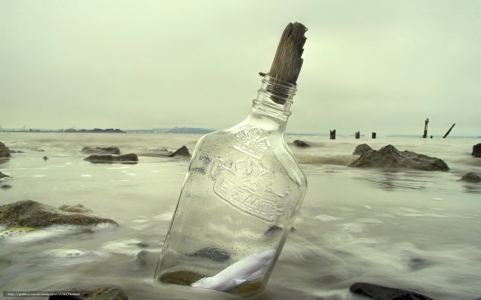 bottle with message on beach