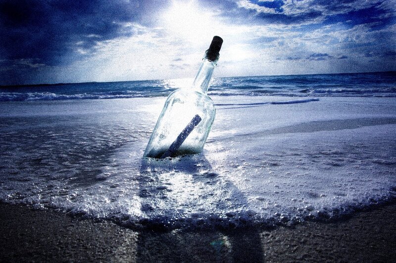 bottle with message on beach