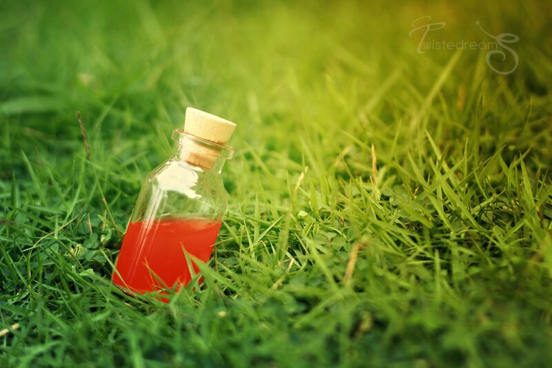 Bottle with Red Liquid