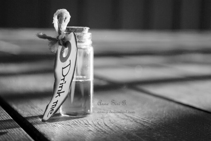 Bottle with Tag on Wood