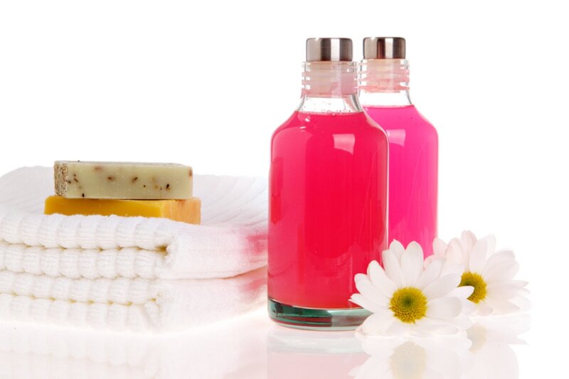 Bottles and Soap on Towels