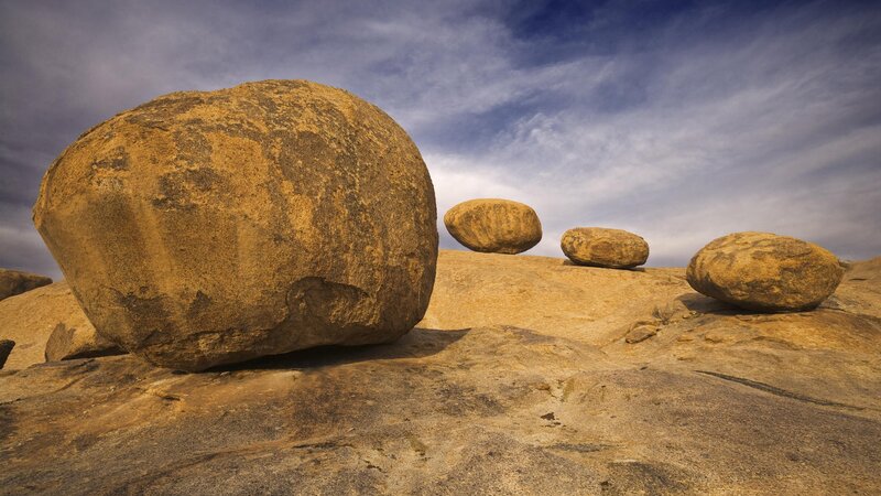 Boulder formation under cloudy sky