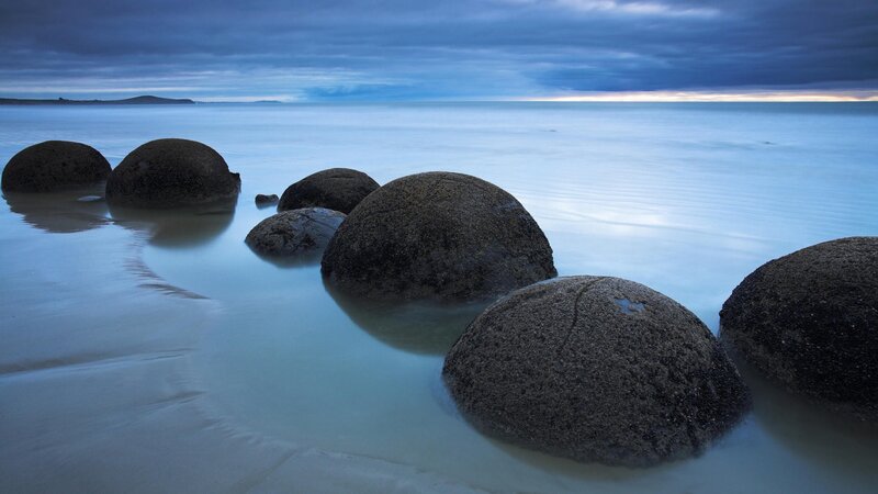 Boulders on a calm beach