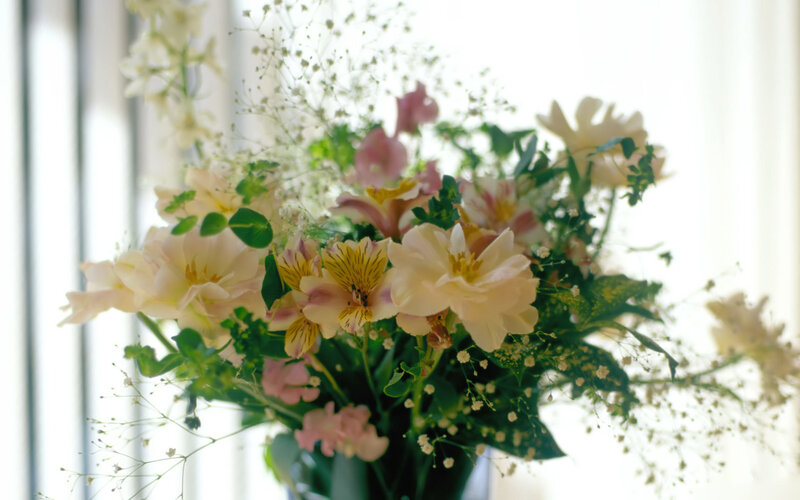 bouquet of flowers by window