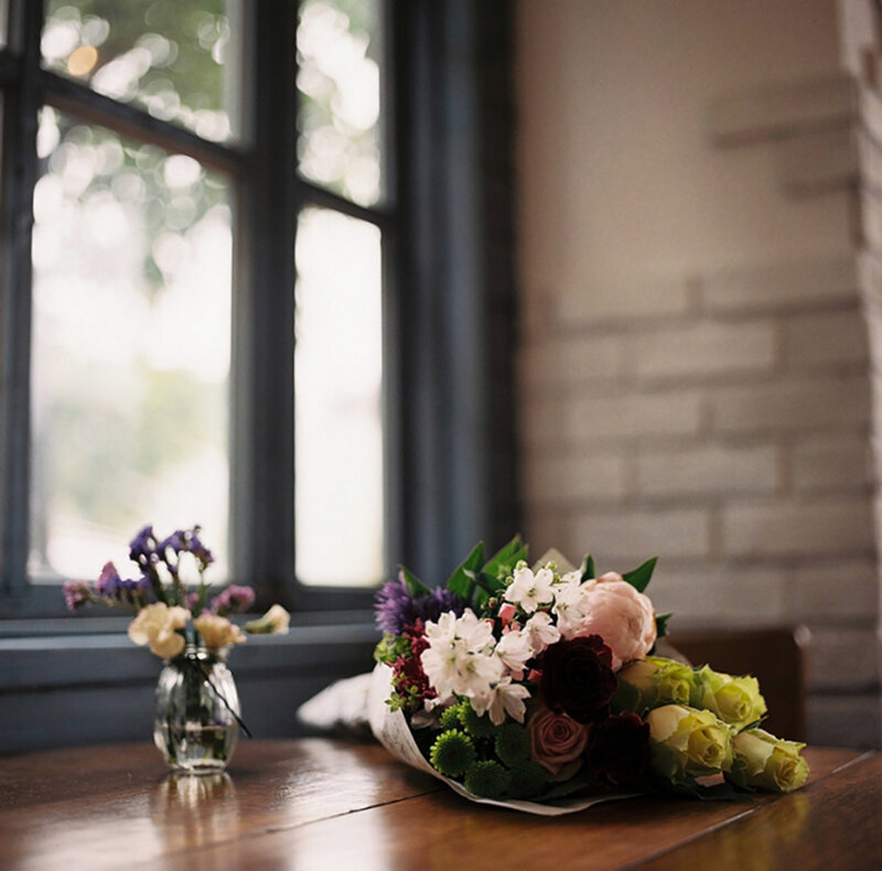 Bouquet of Flowers on Table — Brown