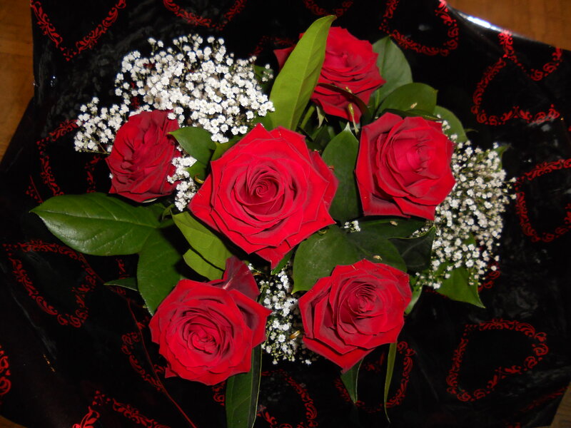 Bouquet of Red Roses — Romantic, Photograph, Baby's Breath, Green Leaves, Black Wrapping Paper