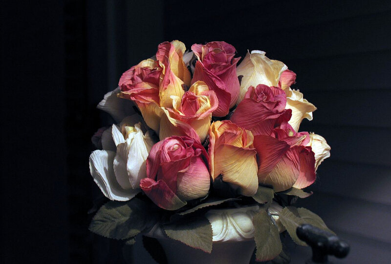bouquet of roses in dark setting
