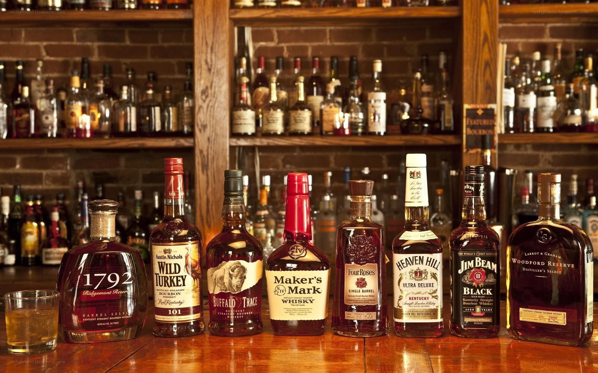 Bourbon bottles on bar counter