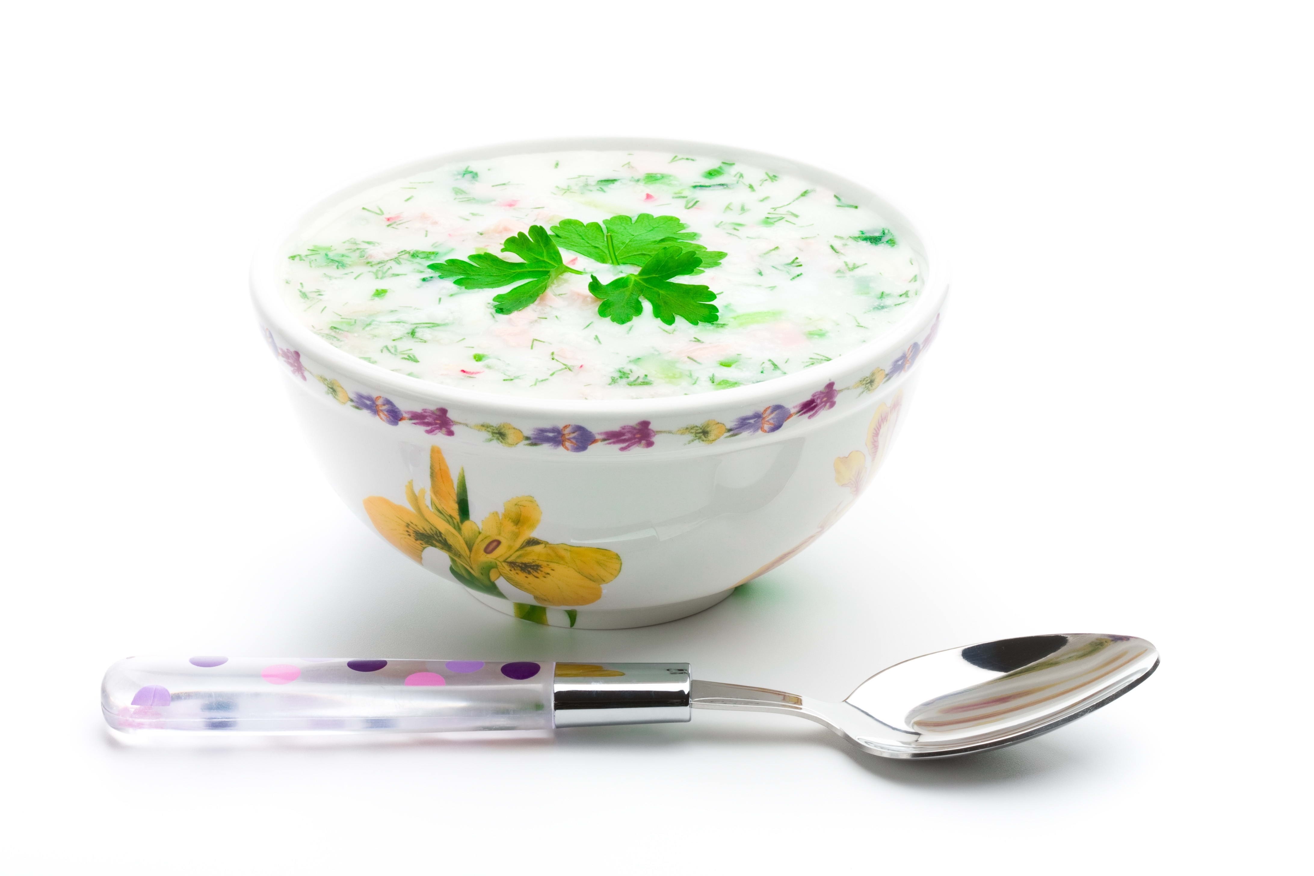 bowl of creamy soup with herbs