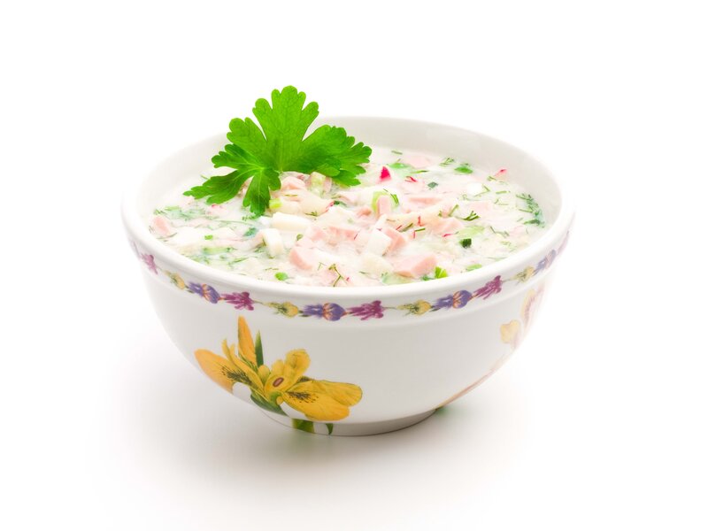 bowl of creamy soup with herbs