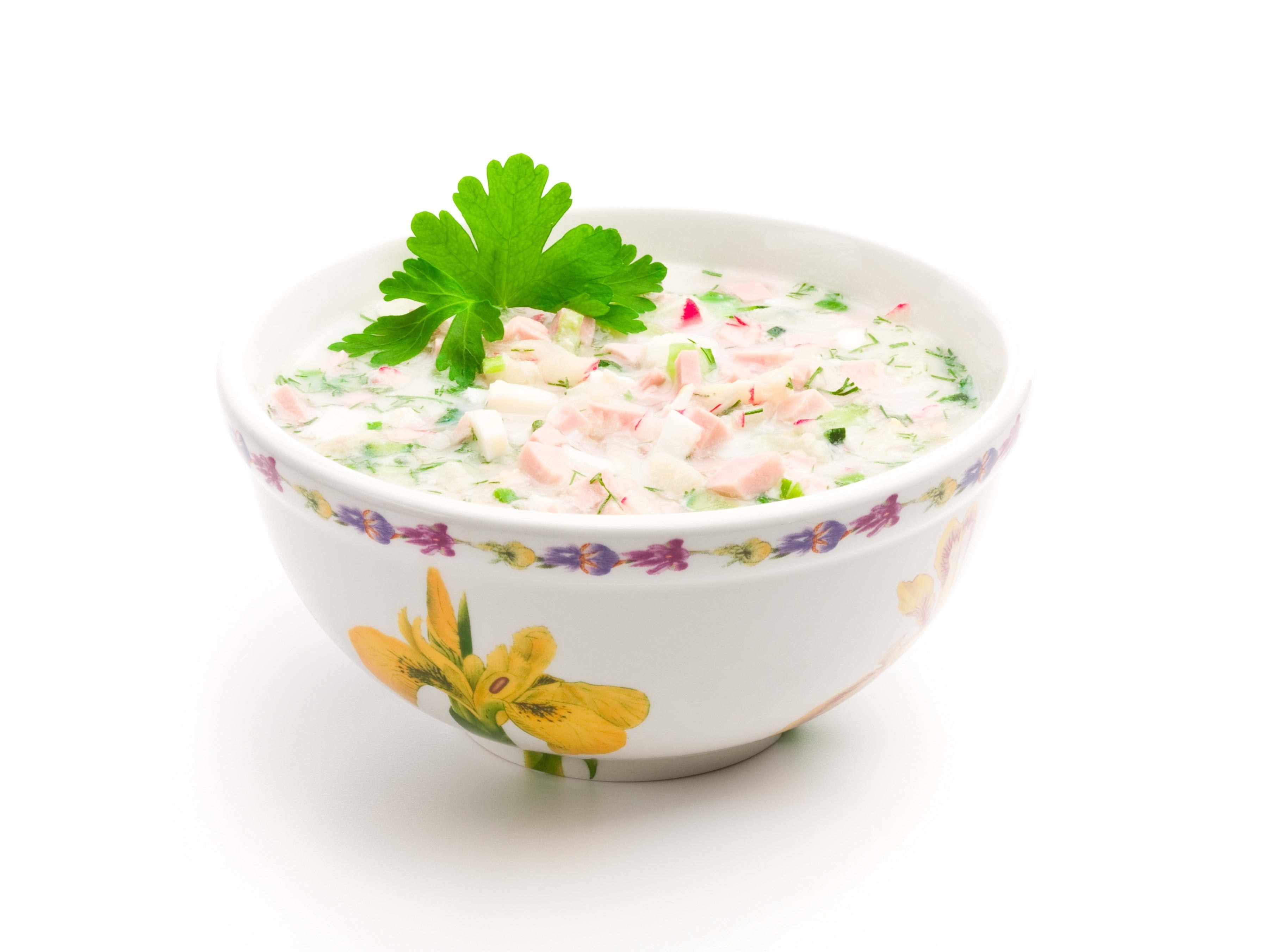 bowl of creamy soup with herbs
