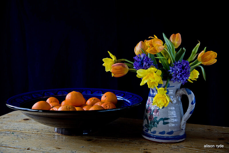 Bowl of Oranges and Flowers