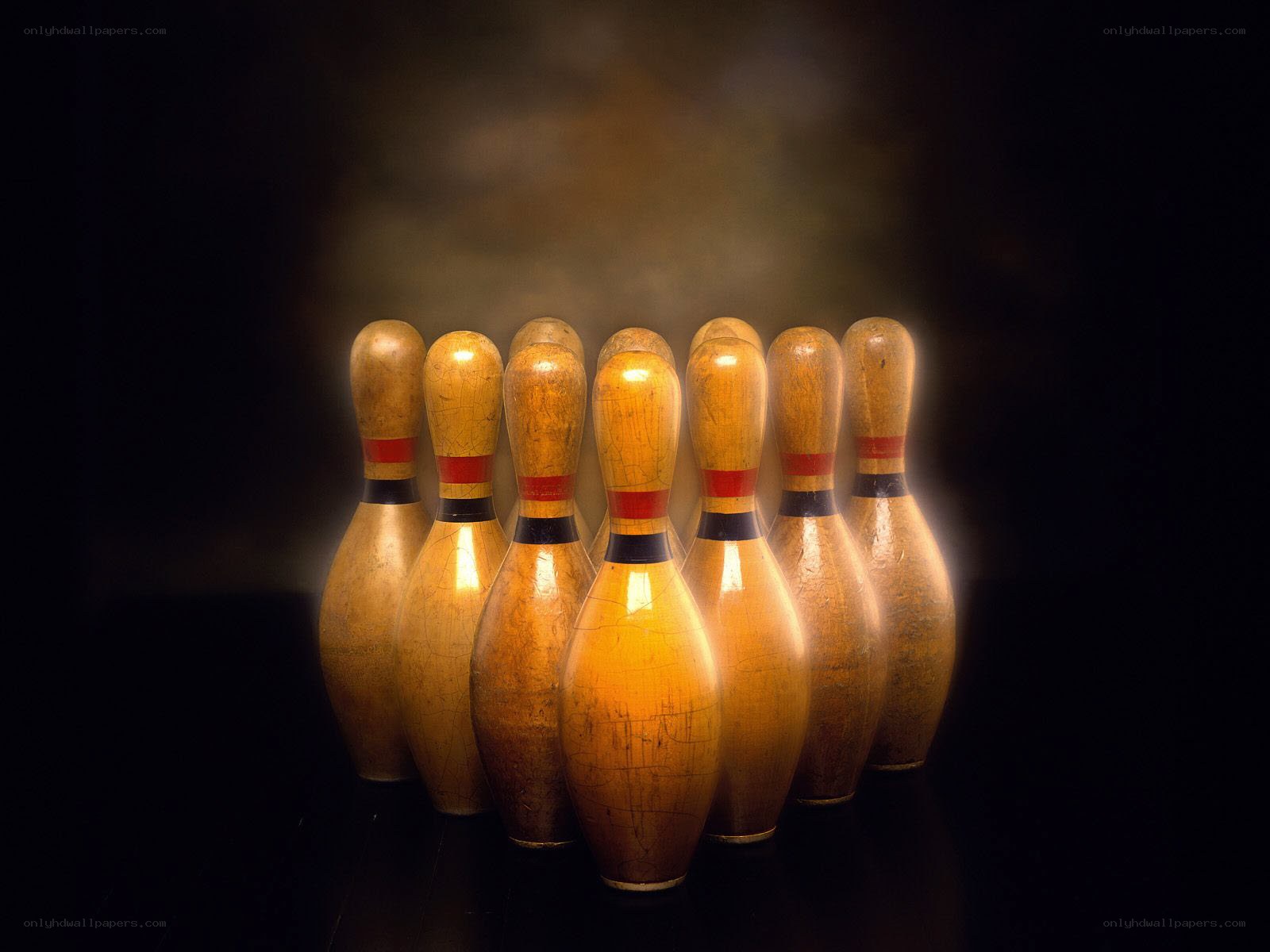 Bowling pins in dramatic lighting