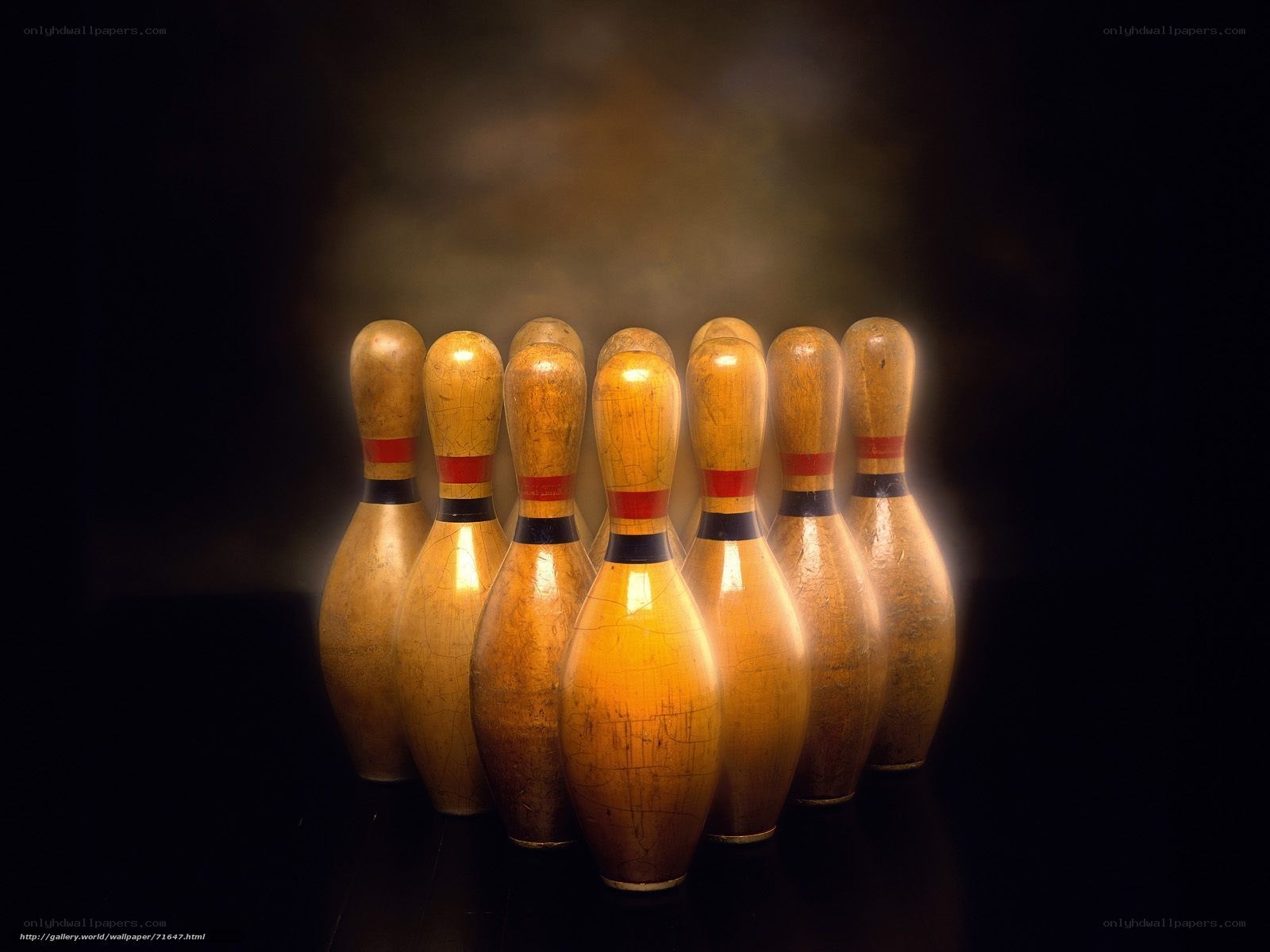 Bowling pins in dramatic lighting