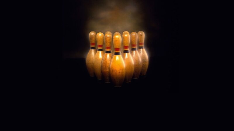Bowling pins in spotlight