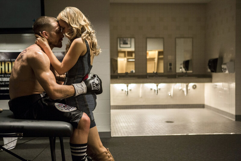 boxer and woman embrace