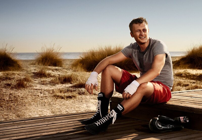 boxer on beach bench