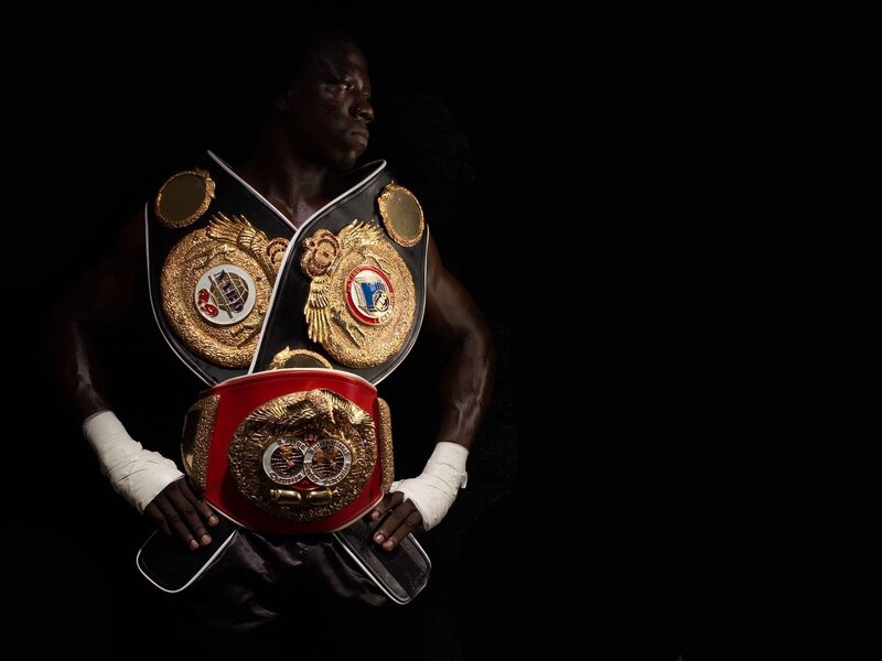 boxer with championship belts